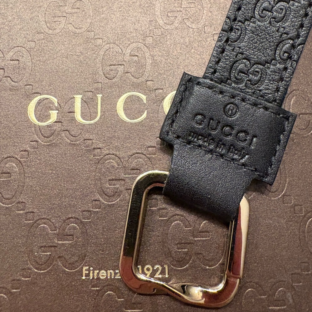 Authentic Gucci Embossed Leather key chain with Gold Buckle NEW